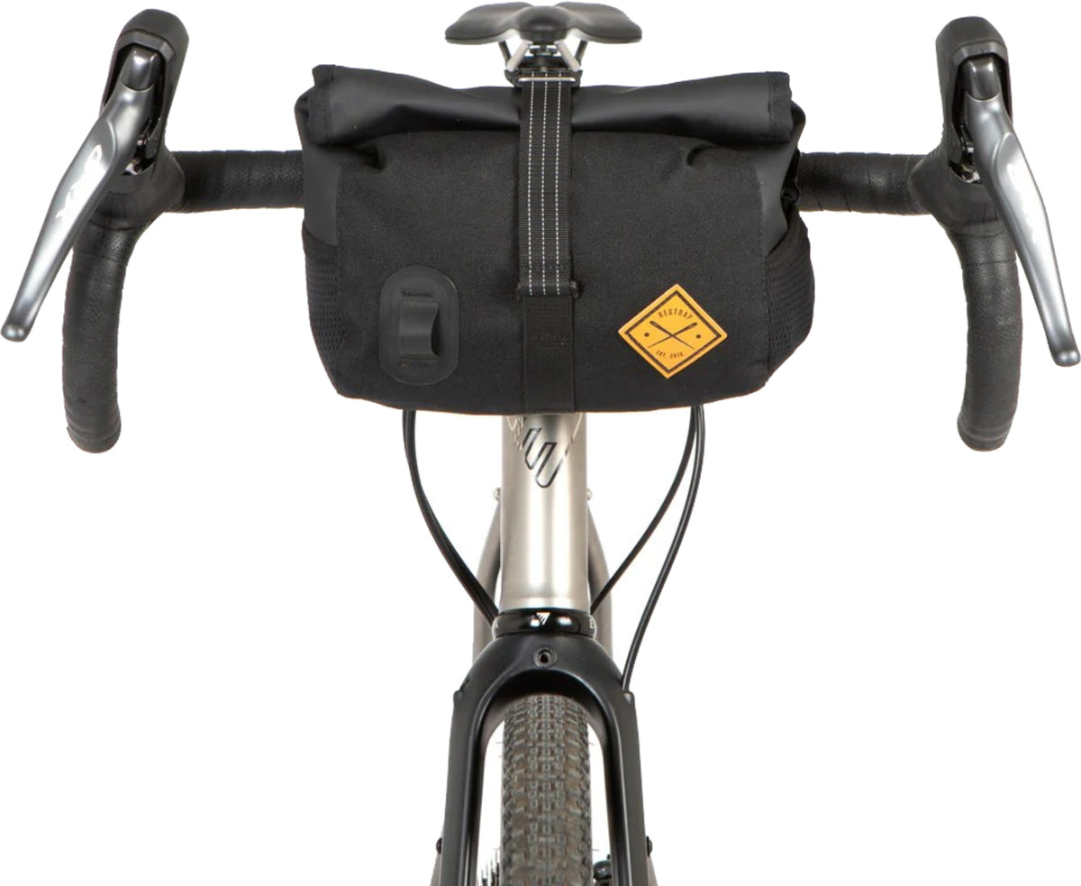 Roll top canister bag