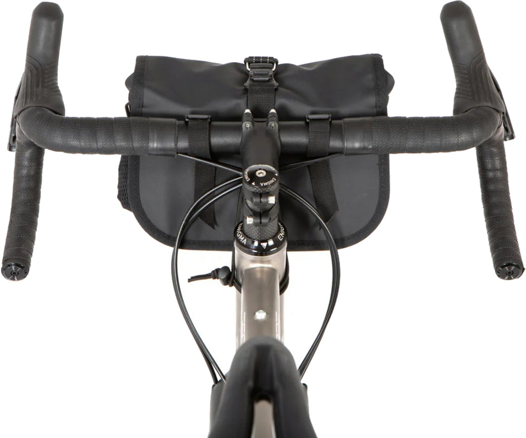 Roll top canister bag
