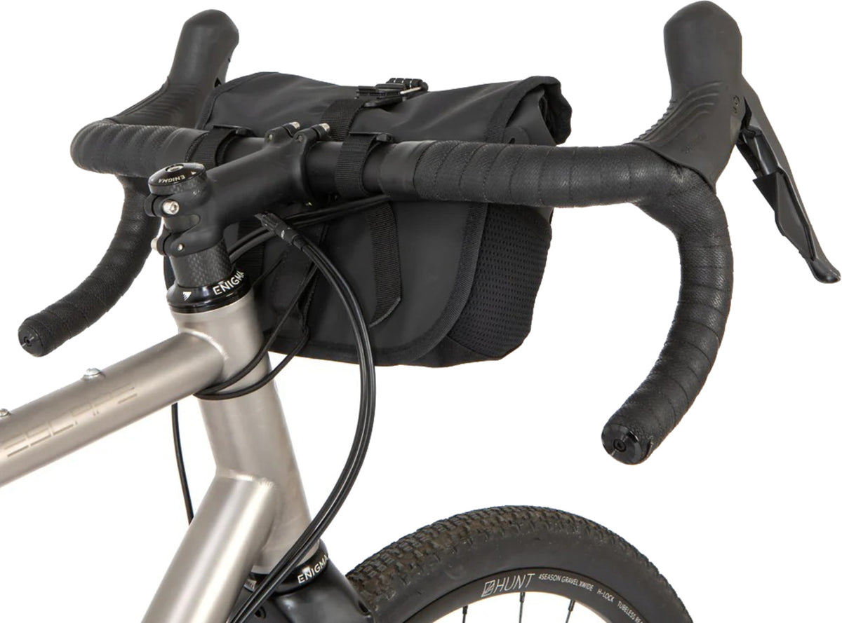 Roll top canister bag