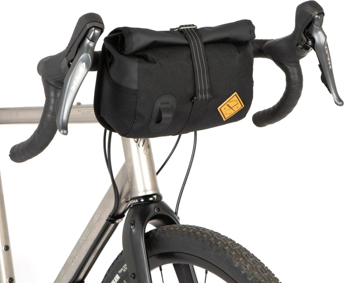 Roll top canister bag